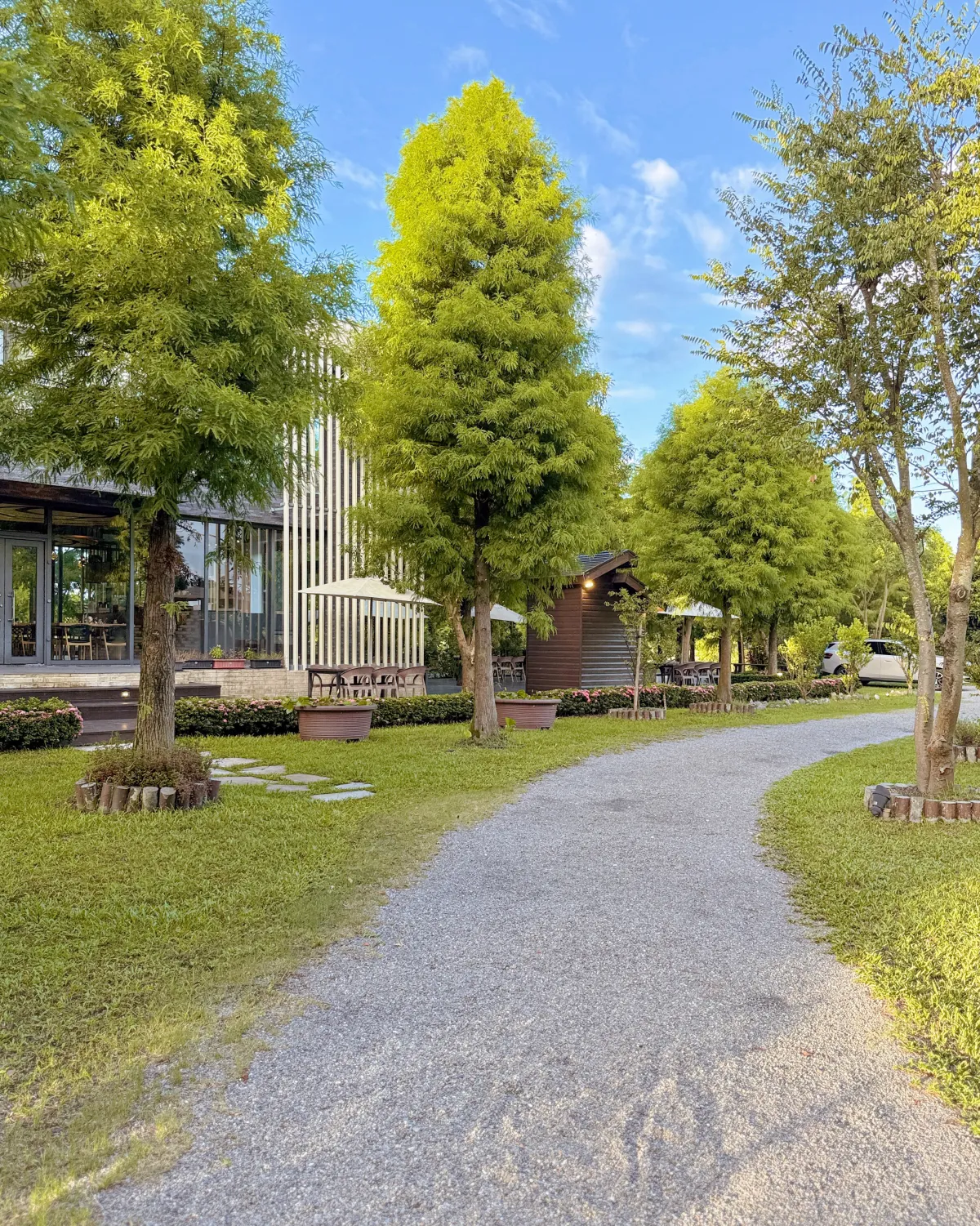 Outdoor garden path at LOHERB F Hall