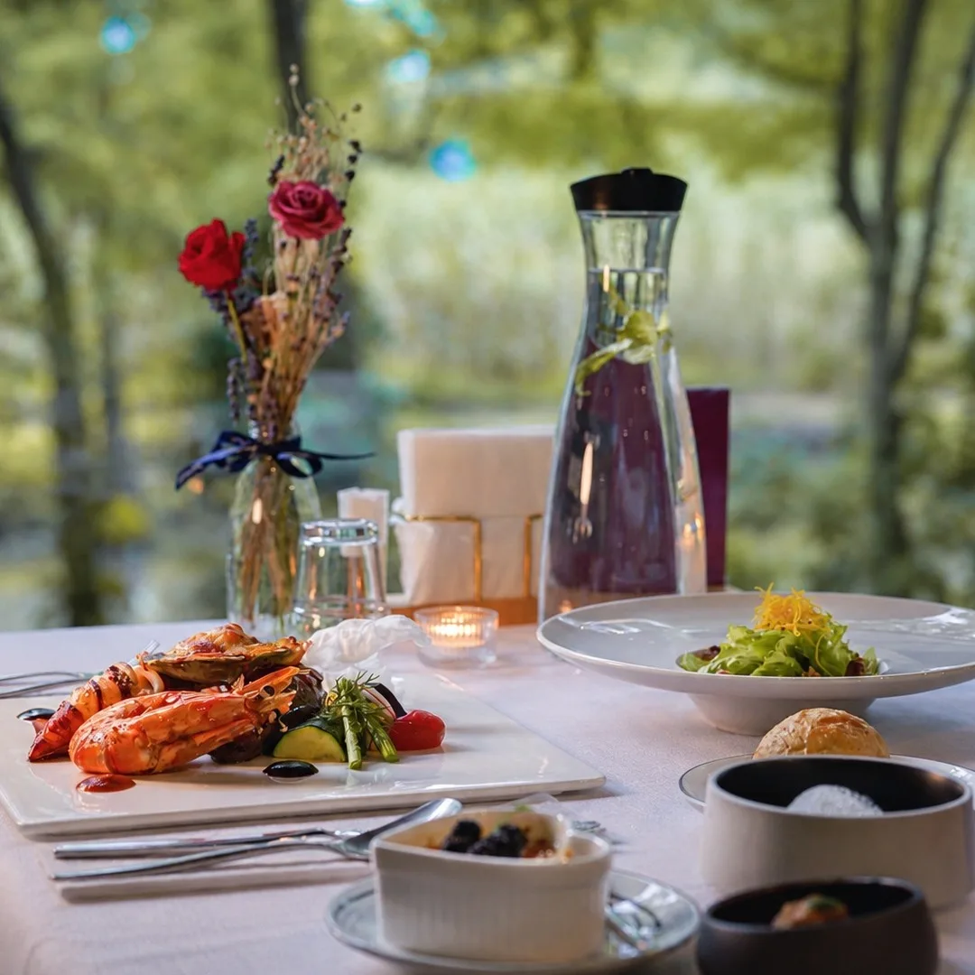 An elegant dinner by the window at LOHERB Cuisine